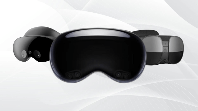 Three sleek headsets are displayed against a light, textured background. The headsets vary in design and color, showcasing the futuristic style of the Apple Vision Pro.
